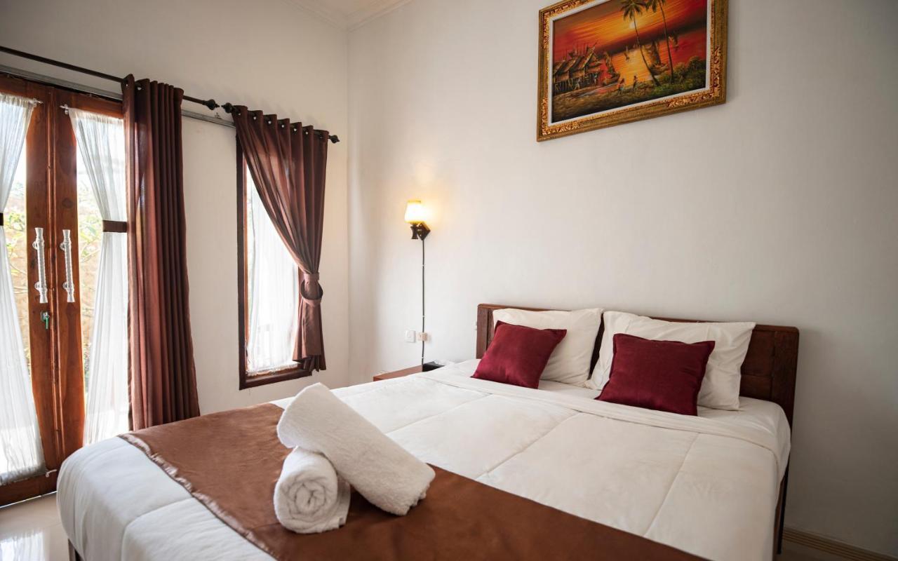 Santhi Guna Bungalow Toyapakeh ภายนอก รูปภาพ