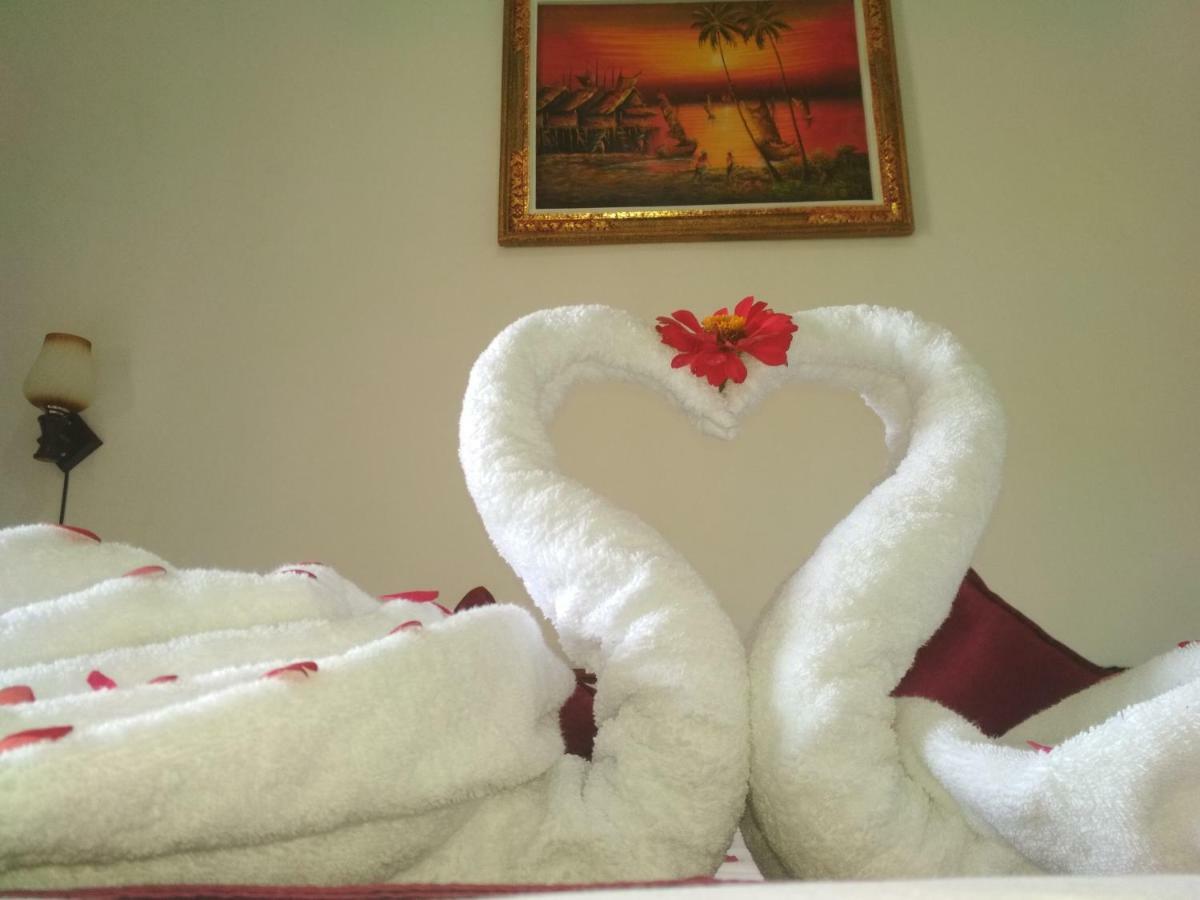 Santhi Guna Bungalow Toyapakeh ภายนอก รูปภาพ